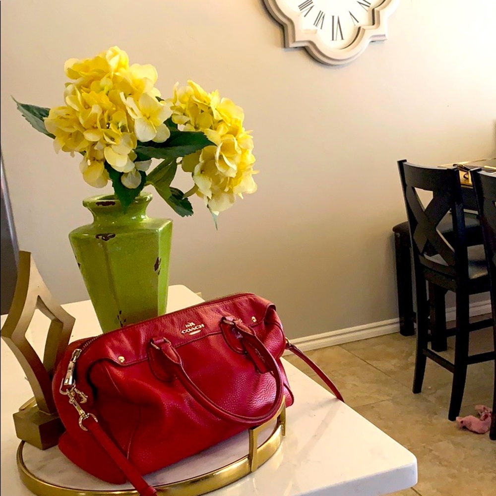 Authentic red leather Coach crossbody bag.